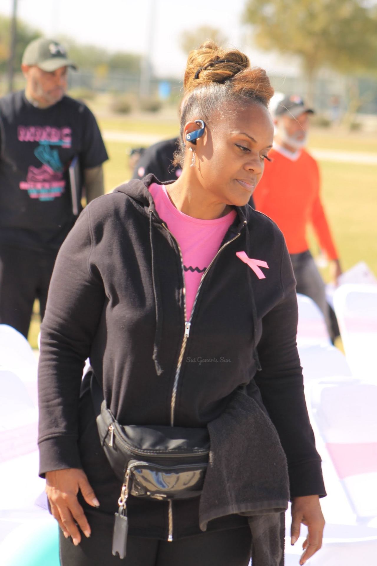 Walker with a pink ribbon